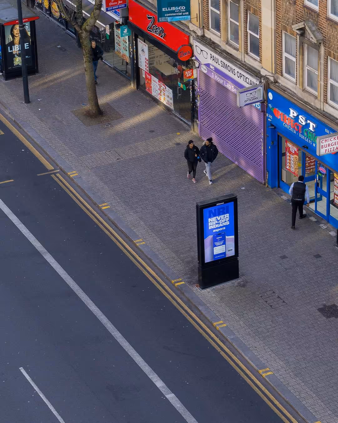 Aspora app UI featured in OOH campaign creative by Noise Media Group