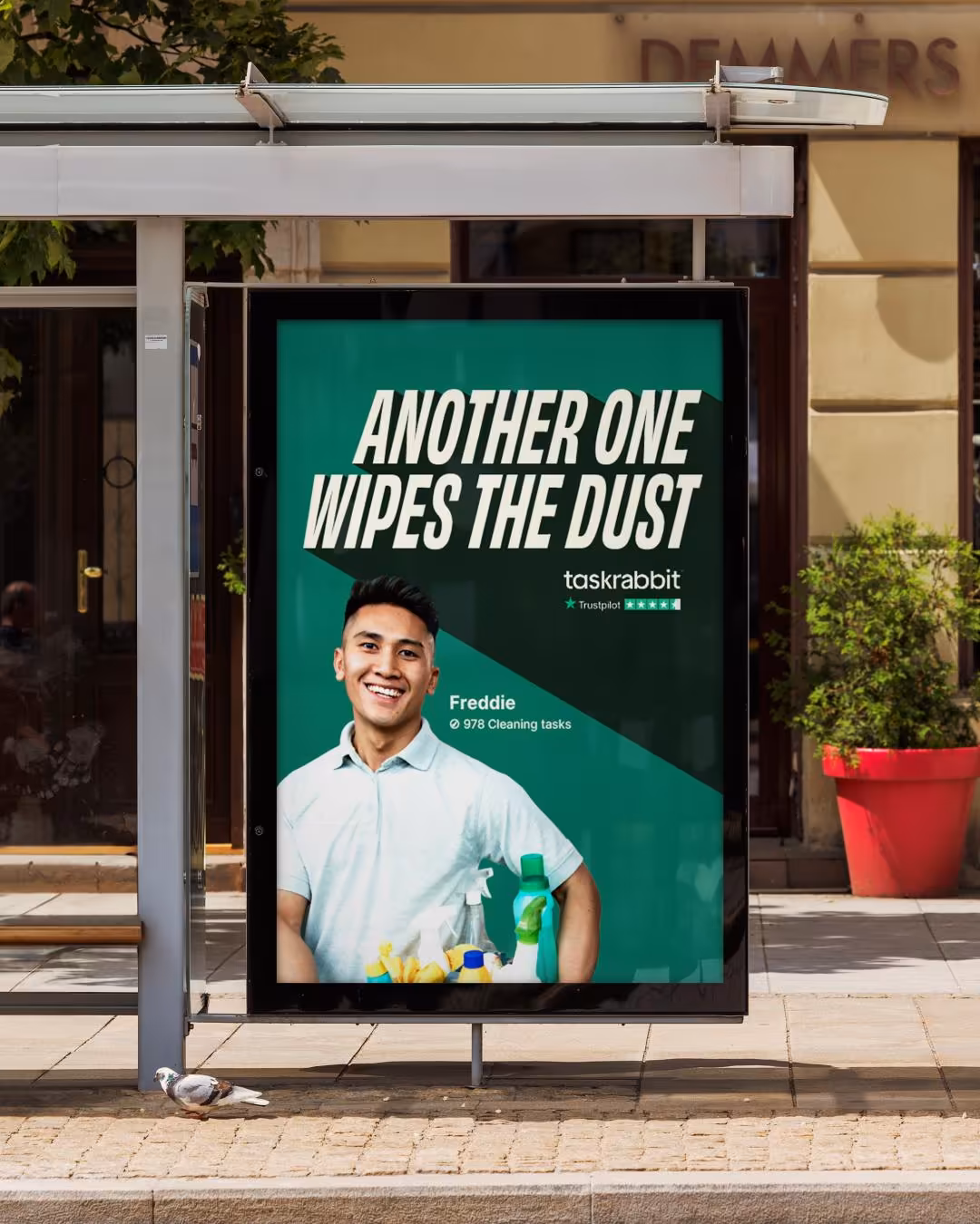Photo of a TaskRabbit advert at a bus stop - the advert uses song lyrics 'another one wipes the dust'